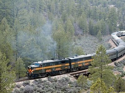 A train is departing the Grand Canyon back to Arizona