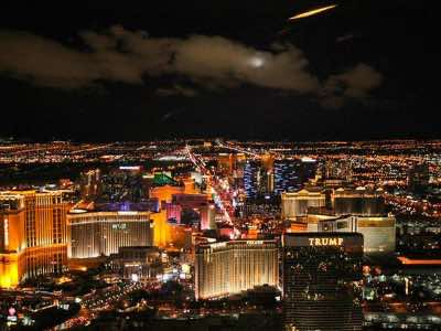 View of Las Vegas Strip at night - Caesar's Palace is all lit up at night
